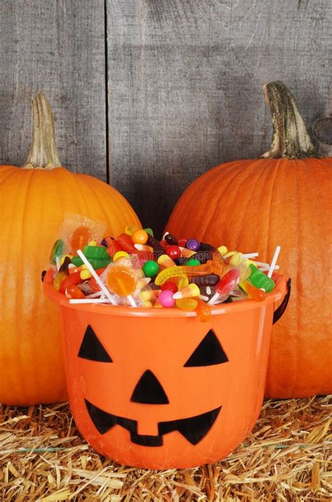 Candy Filled Halloween Pumpkin Bucket Stock Photo - Image of close ...