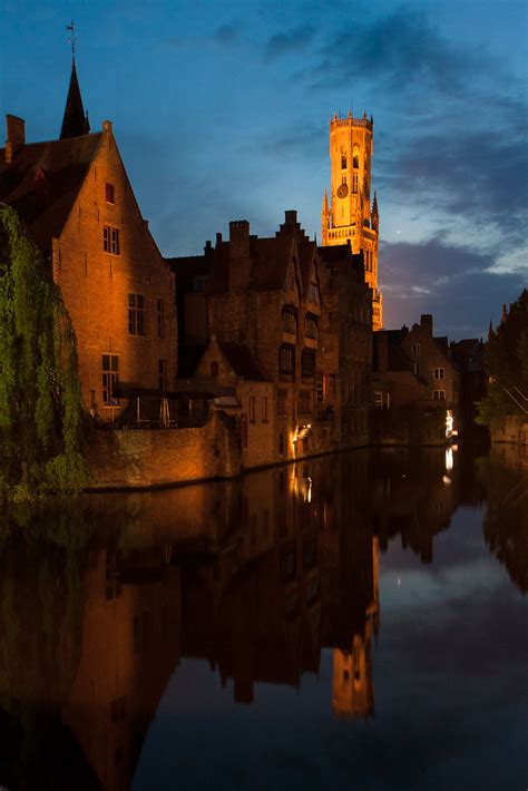 Bruges | Bruges' medieval buildings and Belfort reflected in… | Flickr