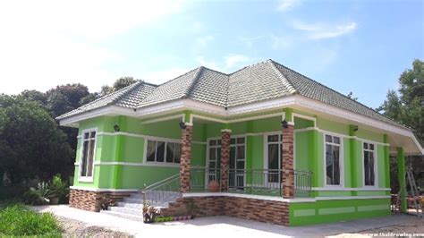 Bungalow with an Impressive Exterior Color and Roofs - House And Decors