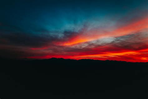 Silhouette of Mountain During Sunset · Free Stock Photo