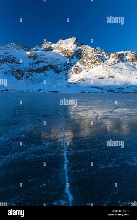 Sunrise at the lago bianco at the berninapass hi-res stock photography ...