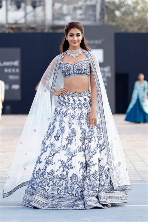 Pooja Hegde looks elegant and elusive in glitzy lehenga by Varun ...