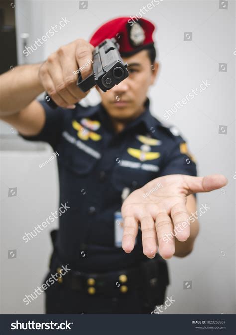 Police Officer Uniform Red Beret Aiming Stock Photo 1023253957 ...