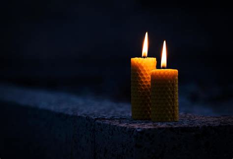 Two candles in the dark 2175368 Stock Photo at Vecteezy