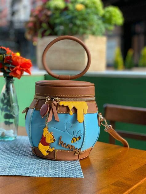 The Winnie The Pooh Hunny Bag From Danielle Nicole Is A Sweet Treat ...