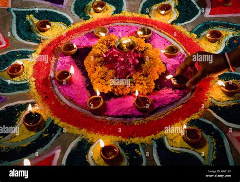 Diya with Rangoli Stock Photo - Alamy