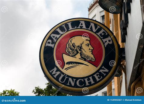 Paulaner logo on street editorial photography. Image of street - 154905587