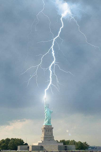 Lightning striking the Statue of Liberty : r/pics