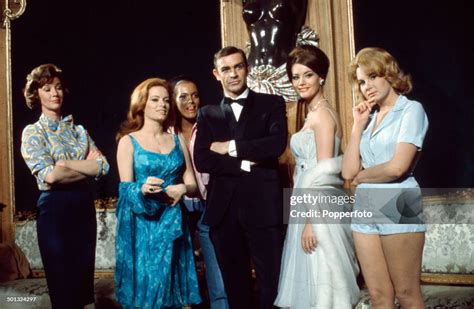 Scottish actor Sean Connery posed with Lois Maxwell, Luciana Paluzzi ...