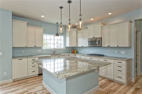 Off white kitchen cabinets. Light blue walls in a kitchen. | Light blue ...