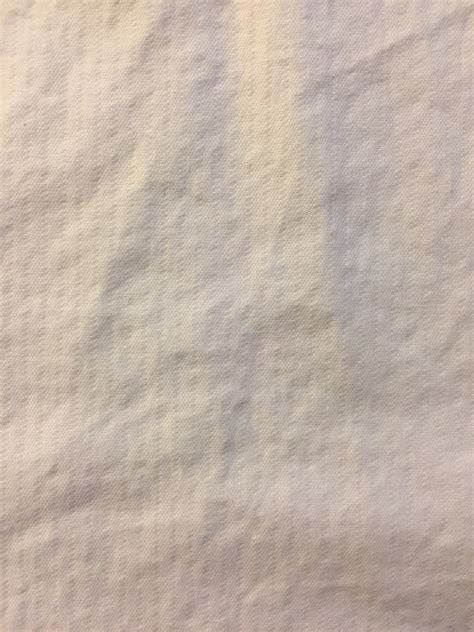 Close up of off white wrinkled bed sheet | Free Textures