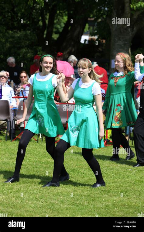 Young irish teenage girls dancing a traditional jig at a summer fete ...