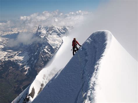 Top of Eiger - Enjoying the summit ridge after climbing the Eiger north ...