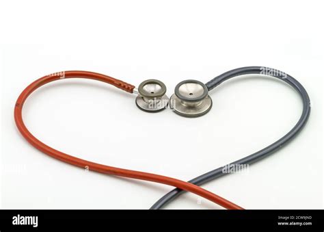 Heart shape of pink and blue stethoscope on white background Stock ...