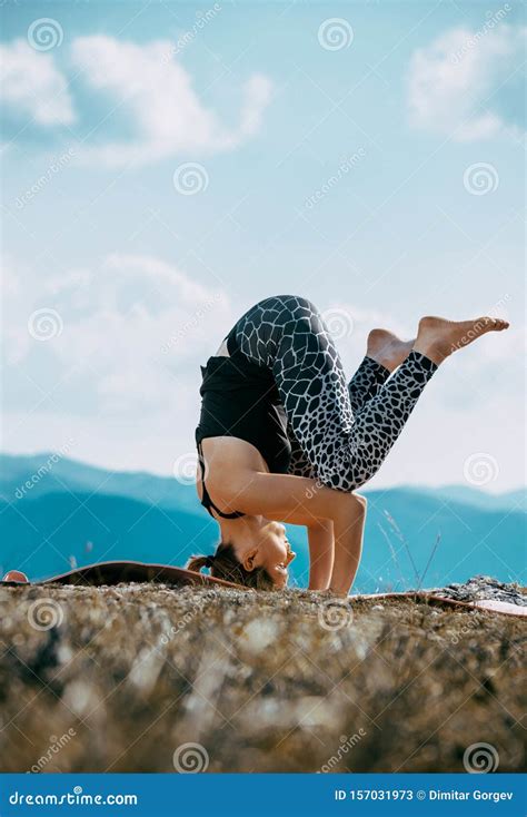 Fit Woman Doing Yoga Exercise at the Mountain Hill Stock Image - Image ...