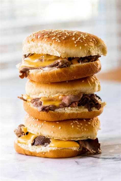 Hot Roast Beef Sandwiches with Cheddar Cheese Sauce - Girl Gone Gourmet