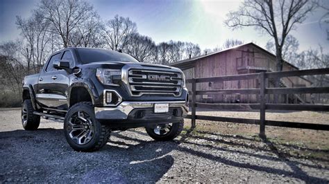 GMC BLACK WIDOW LIFTED TRUCKS — SCA Performance | Black Widow Lifted Trucks