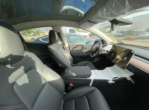 Tesla Model Y Front Seats - TESLARATI