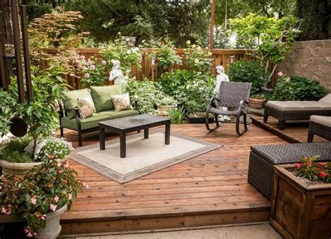 Lining a deck or patio with lush container garden creates a sense of ...