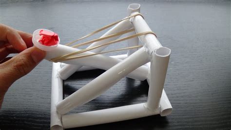 How to make a catapult out of paper - YouTube