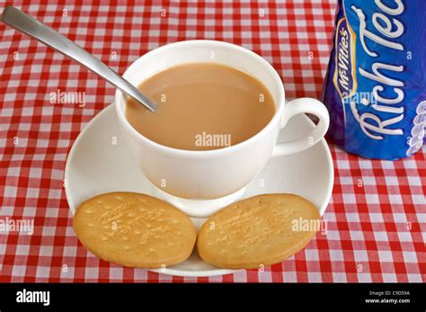 McVities Rich Tea biscuits with cup of tea Stock Photo - Alamy