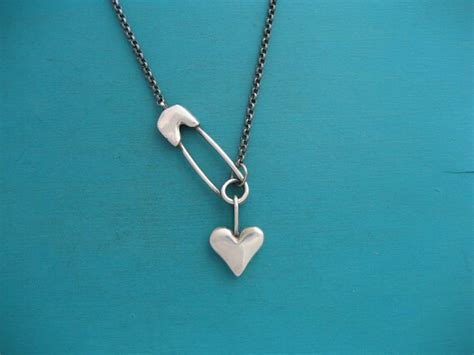 Items similar to Sterling silver safety pin and heart necklace- rock ...