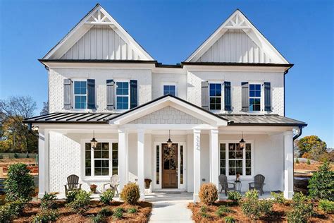 White Brick House with Black Shutters