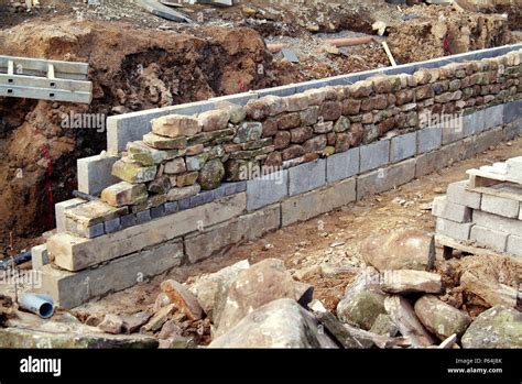 Construction of dry stone wall Stock Photo - Alamy