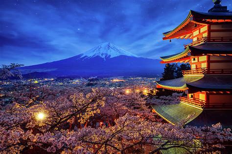 Night sky Mt. Fuji and temple red pagoda in Fujiyoshida with che ...