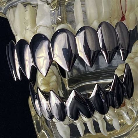 Black Plated Shark Teeth Grillz Set | Grillz, Grills teeth, Grillz teeth