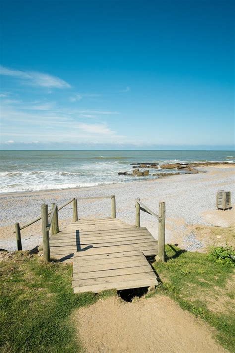 La Paloma beach stock image. Image of sunny, footbridge - 79655421