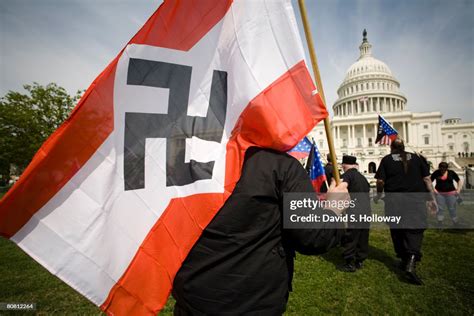 Members of the National Socialist Movement wave American Flags and ...