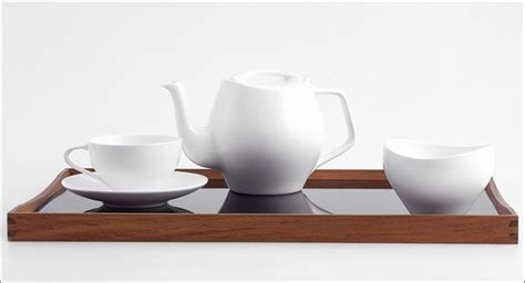 The simple, white, smooth curves of this modern tea set make it a ...