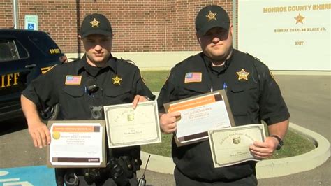 Two Monroe County Sheriff's deputies recognized for their heroics