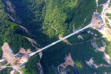 ZhangJiaJie world’s highest and longest glass bridge - China Tours ...