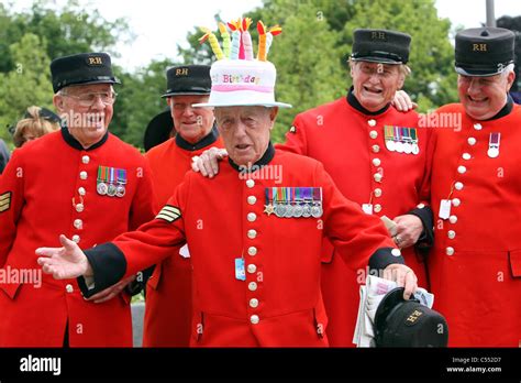 Men in red uniforms celebrating a birthday of one of them, Ascot ...