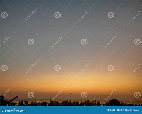 Silhouette of a Group of People Enjoying Sunset at Beach Stock Photo ...