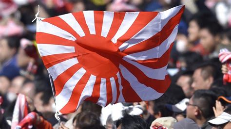 Tokyo 2020: Why some people want the rising sun flag banned - BBC News