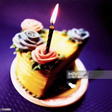 Birthday Cake Slice Candle Photos and Premium High Res Pictures - Getty ...