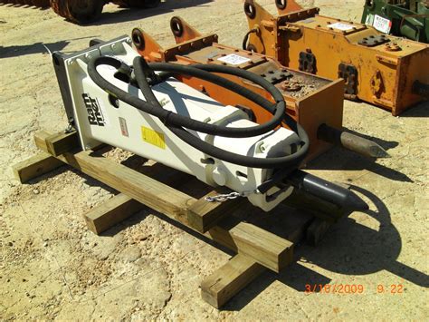 ALLIED RAMMER S25 HYDRAULIC HAMMER - J.M. Wood Auction Company, Inc.