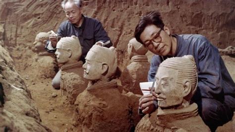 Archeologists excavate and examine ancient terracotta warrior ...