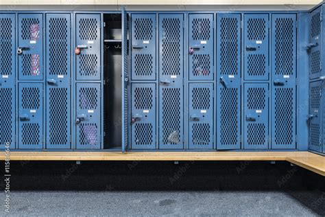 Locker room with blue cage lockers Stock Photo | Adobe Stock