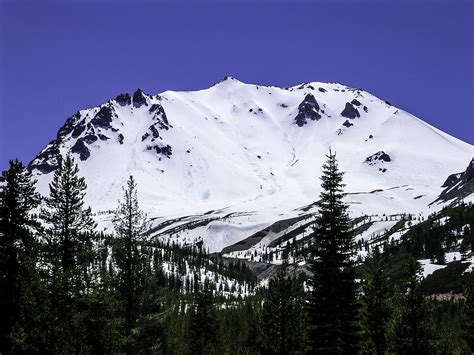 Snow covered Lassen Peak in Lassen Volcanic National Park, California ...