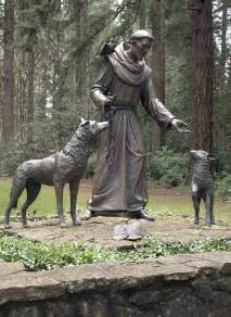 Statue Of St. Francis Of Assisi. Photograph by Gino Rigucci