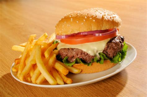 Cheeseburger And French Fries Stock Photo - Download Image Now - iStock