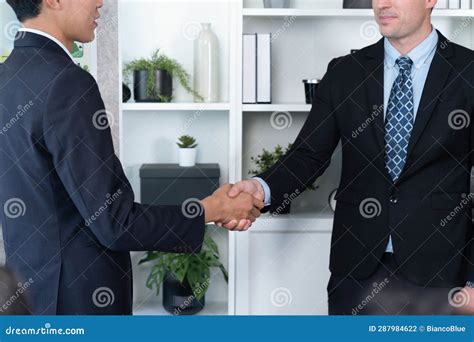 Asian Business People Shake Hand after Made Successful Deal. Quaint ...