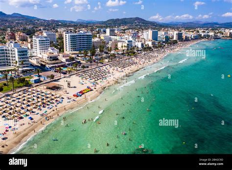 Spain, Balearic Islands, Cala Bona, Aerial view of resort town and ...