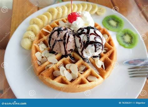 Baking Waffles with Ice Cream and Almonds Toppings Stock Image - Image ...