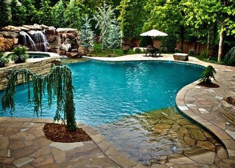 Like the stone work around this one, also the entry area | Swimming ...