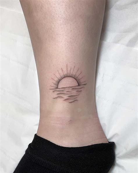 Sunrise tattoo by Conz Thomas inked on the left ankle | Sunset tattoos ...